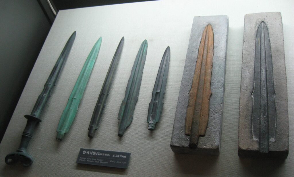 Image showing 7 different styles of iron daggers used in early iron age