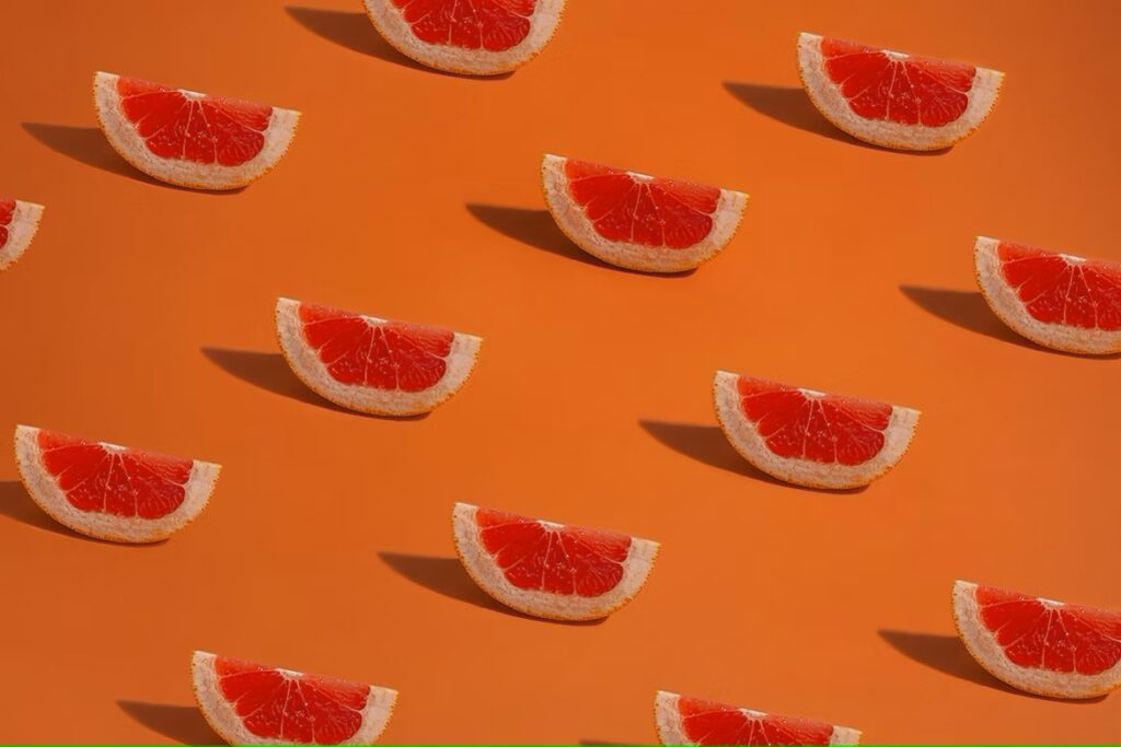 Pattern of Grapefruits on an orange background